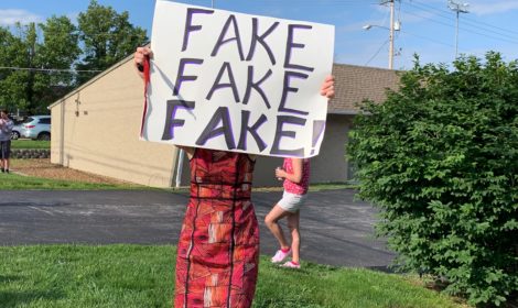 Sign saying "fake fake fake" outside anti-abortion fake clinic