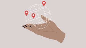 A navigational equipment, an isolated hand holding a globe with GPS location pointers on it